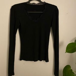 Super cute black V-neck long-sleeve with lace.